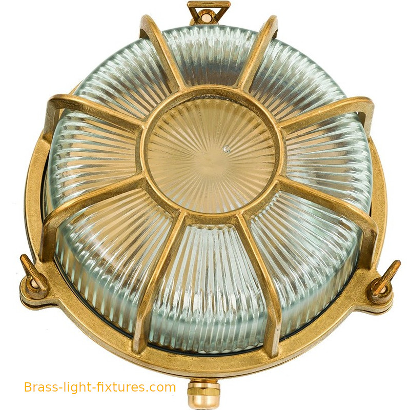 Ship lights is a round bulkhead exterior wall light. Solid cast brass construction for lifetime durability.